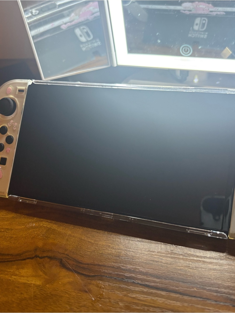 Nintendo Switch Handheld Console with Pink Accent Joy-Con Covers